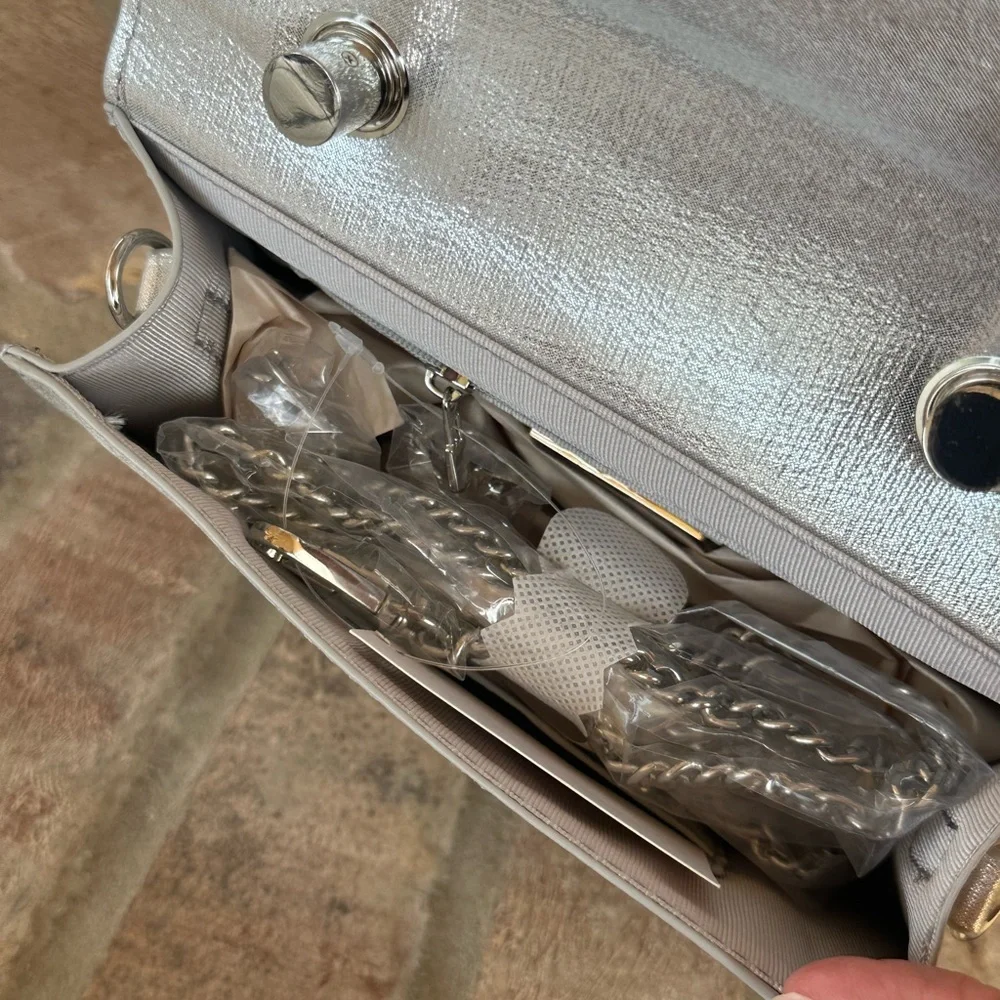 NWT Urban Expressions Silver Clutch/Purse with handle and matching chain straps.